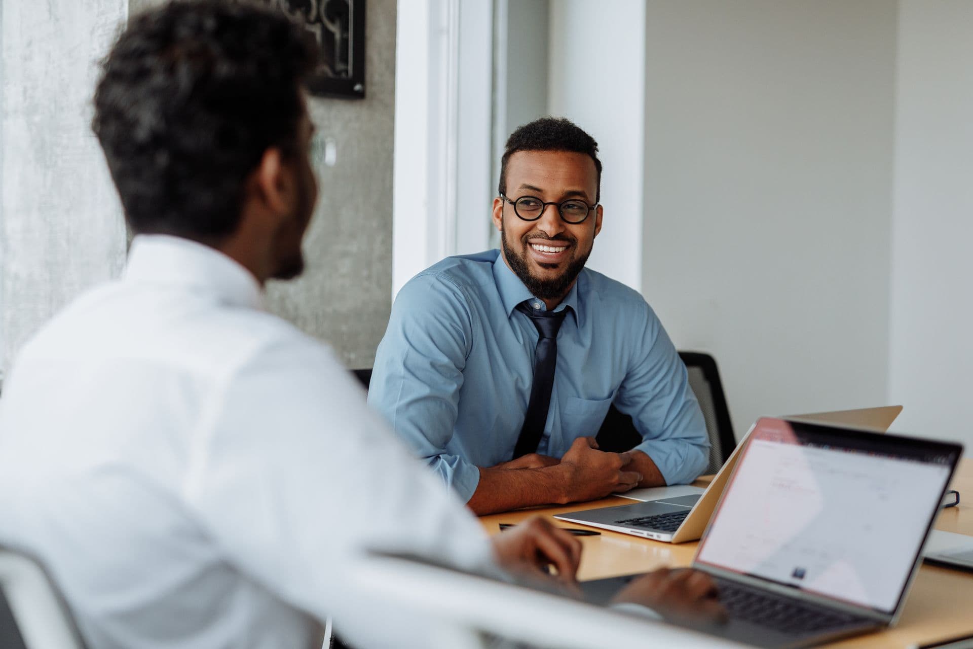 Consultants discussing a client project